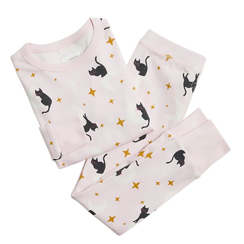 folded kids pink pajamas in a all over black cat print