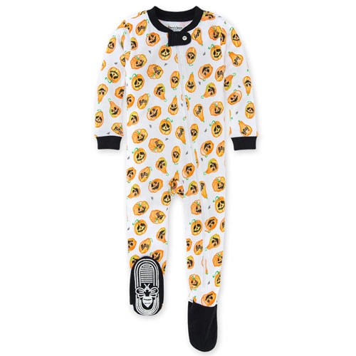 burt's bees newborn sleeper white pajamas in an allover print of smiling orange pumpkins