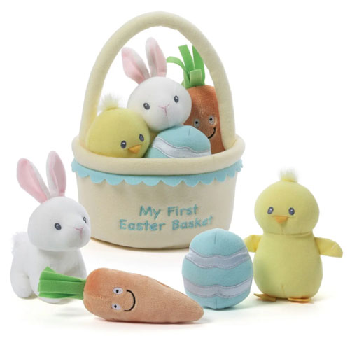 assortment of easter plush toys in a basket with the text "my first easter basket"