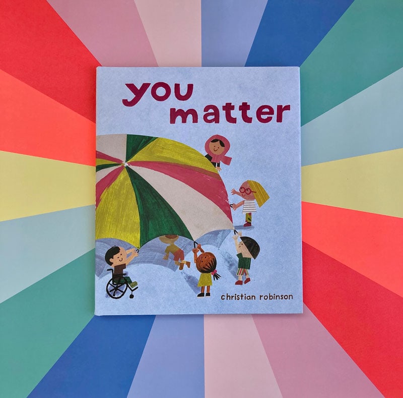 You matter book on a rainbow background