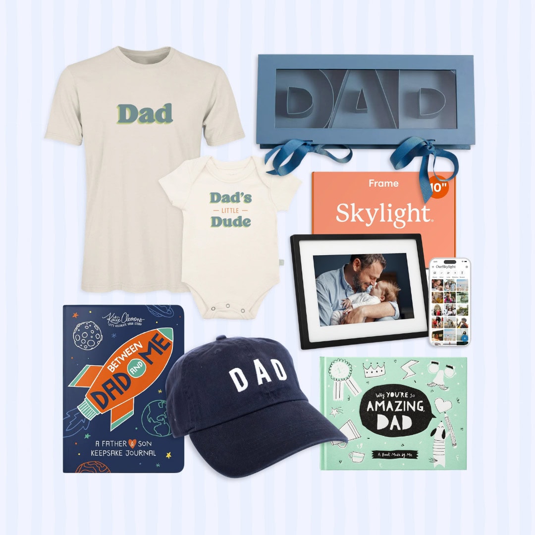 A collection of Father's Day gifts including a t-shirt, onesie, "Dad" embroidered baseball cap, keepsake journal, digital photo frame, and decorative "DAD" letter-shaped box